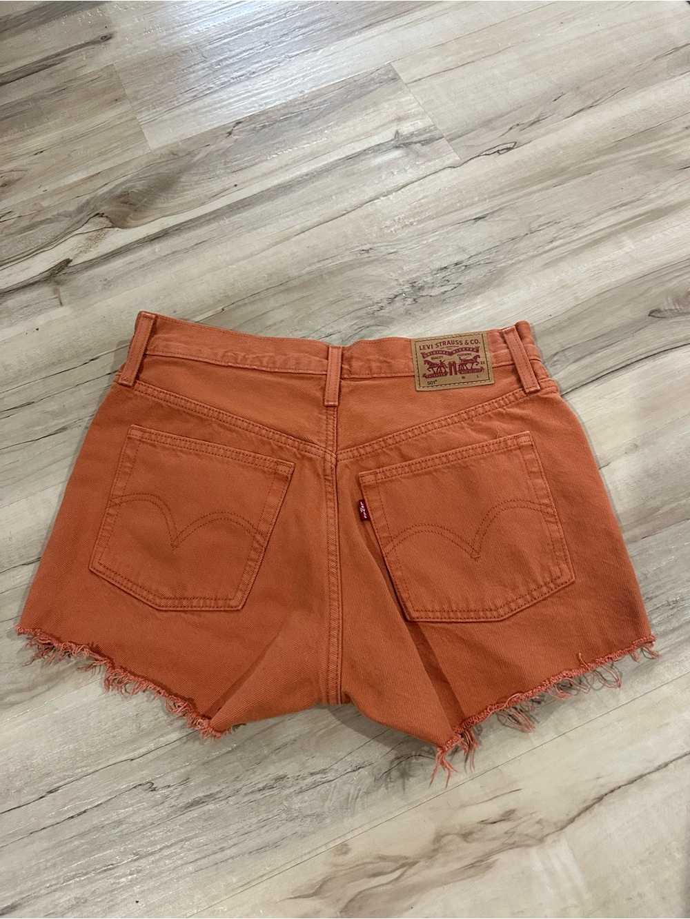 Levi's Orange Frayed Denim Cutoff Shorts